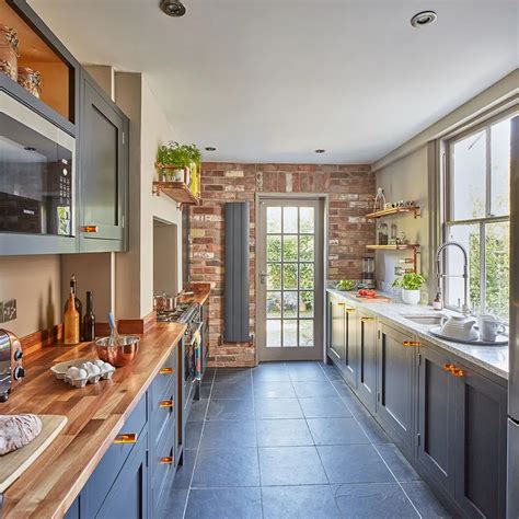 Kitchen Makeover With Dark Blue Units And Walnut Worktops