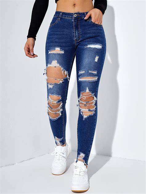 Jeans Ajustados Con Abertura Desgarro Bajo Crudo