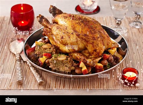 Roast capon stuffed with white sausage and chestnuts Stock Photo - Alamy