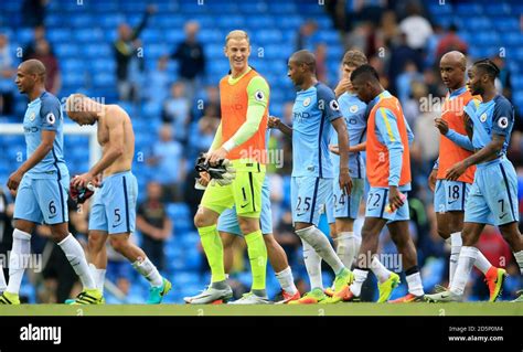 Manchester City Goalkeeper Joe Hart On The Pitch With His Teammates