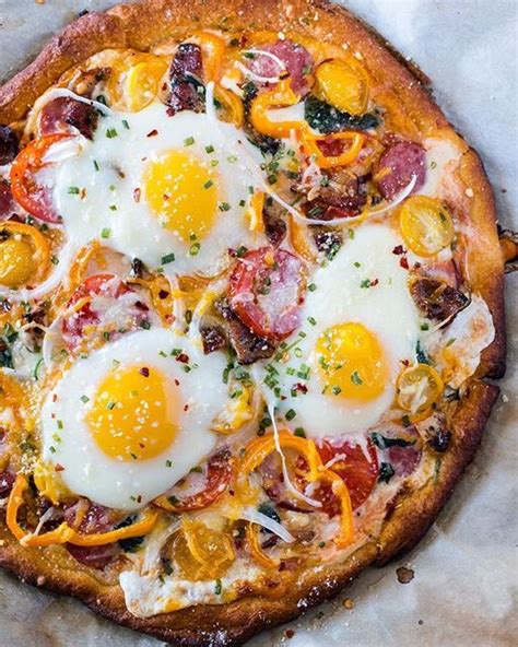 Breakfast Pizza Topped With Eggs Sausage Cheese Bacon And Yellow Peppers By Crumbykitchen