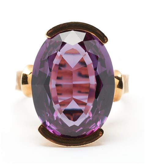 Lot 553: 18K Purple Sapphire Ring | Case Auctions