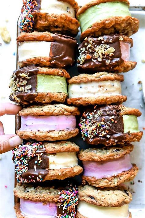 A Tray Filled With Lots Of Different Kinds Of Ice Cream Sandwiches On