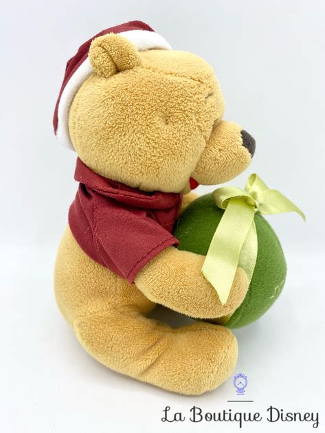 Peluche Winnie l ourson Joyeux Noël Disneyland Paris Disney boule 16 cm