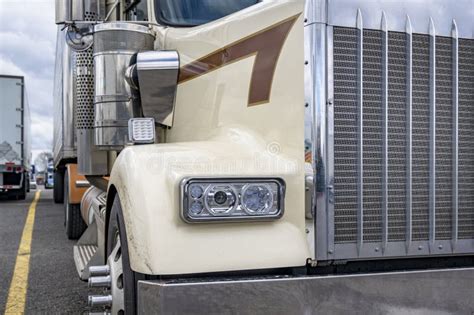 Front Of The Beige Classic Bonnet Big Rig Semi Truck Tractor With Semi