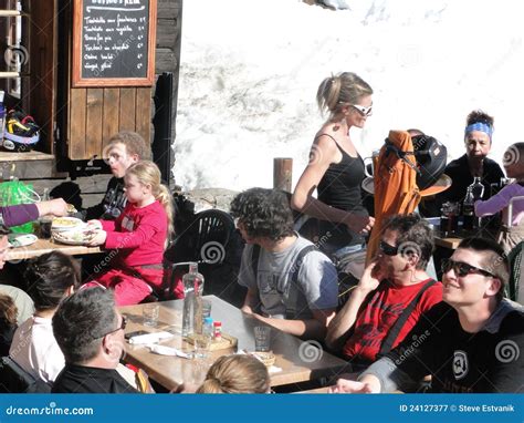 A Pretty Blonde Waitress Serves Lunch Outdoors Editorial Photography Image Of Drink