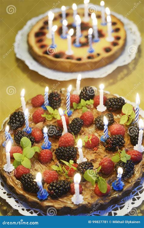 Two Birthday Cakes With Candles Stock Image - Image of happiness, illuminated: 99827781