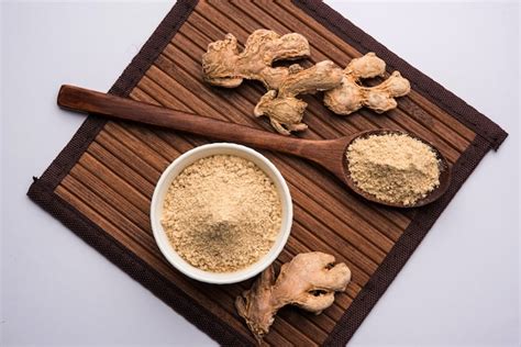 Premium Photo Ginger Or Adrak Powder With Dried Whole Also Known As Sunth Or Sonth In India