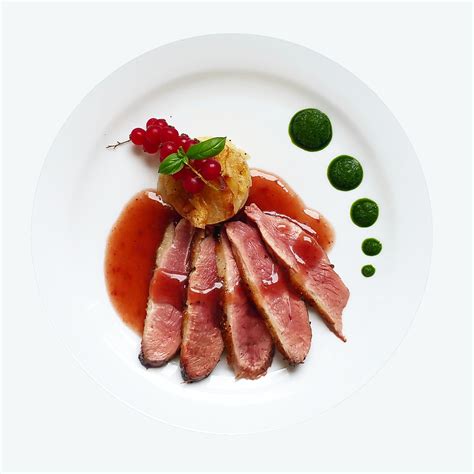 Seared duck breast with raspberry sauce | La Ferme St Jacques