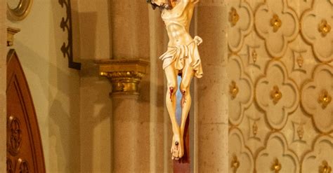 Wooden Cross with a Statue of Jesus in a Church · Free Stock Photo