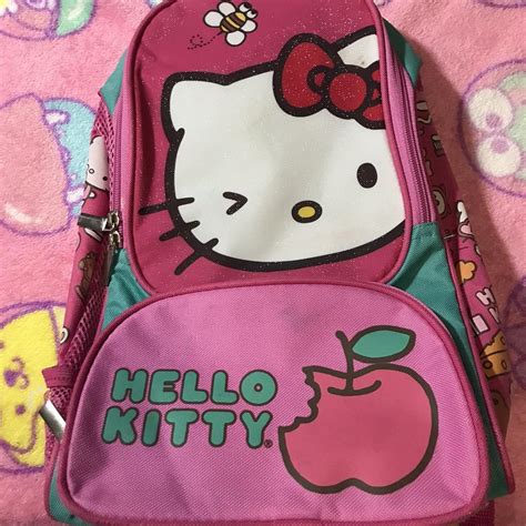 Mini Hello Kitty backpack shows signs of wear (has... - Depop