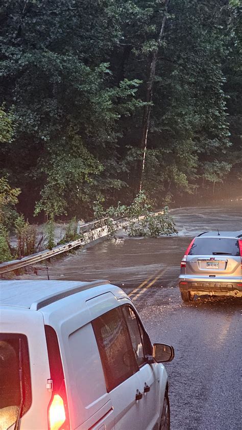 Photos Heavy Rain Causes Flooding Knocks Out Roads And Bridges Nbc