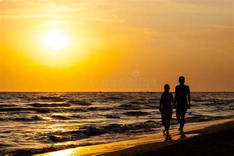 Silhouette of couple walking on the beach. Sunset , #spon, #couple, # ...