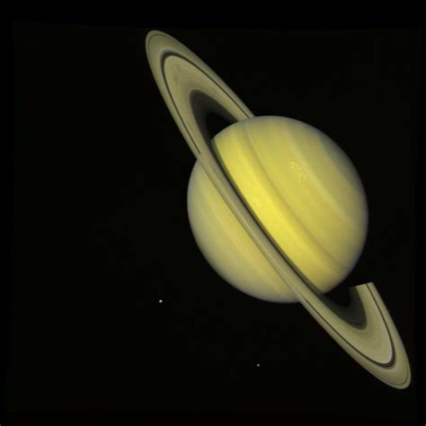 Saturn With Rhea and Dione (True Color)