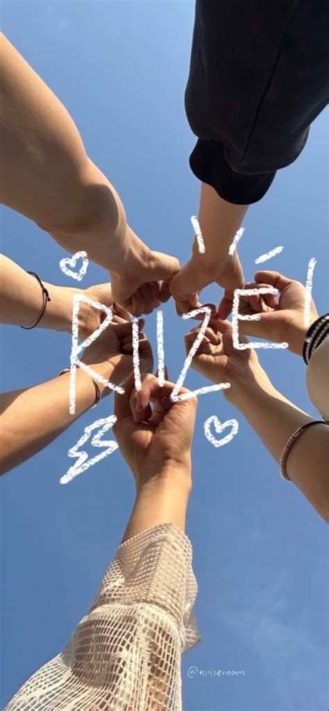 Several People Holding Their Hands Together With The Word Prize Written