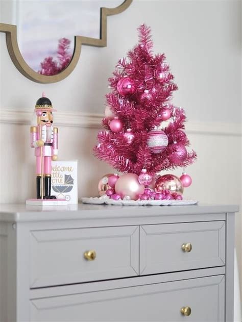 25 Pretty Pink Christmas Decorations That Ll Make You Scream Everygirl Edit