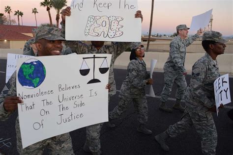 Airmen Assigned To The 56th Fighter Wing Carry Posters NARA DVIDS