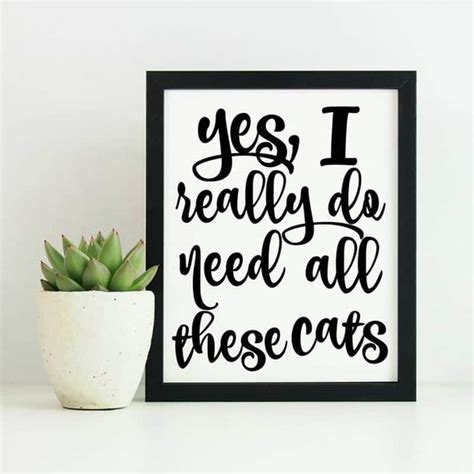 The 30 Funniest Cat Poster Quotes to Hang on Your Walls