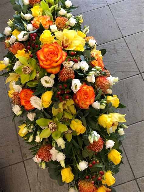 Rich Autumnal Casket Spray Buy Online Or Call 01375 374155