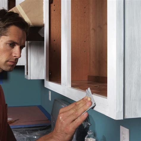 How to Spray Paint Kitchen Cabinets (DIY) | Family Handyman