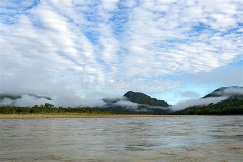 Green Rainforest Mountains In Clouds Amazon River Basin South America