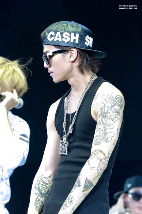 8 Male Kpop Idols with Multiple and Massive Tattoos