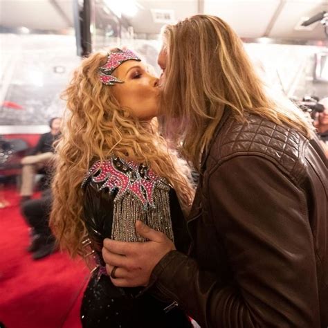 Edge giving his wife Beth Phoenix a kiss backstage | Celebrity couples ...