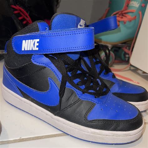 Blue and black Nike high tops. Worn only a couple of... - Depop