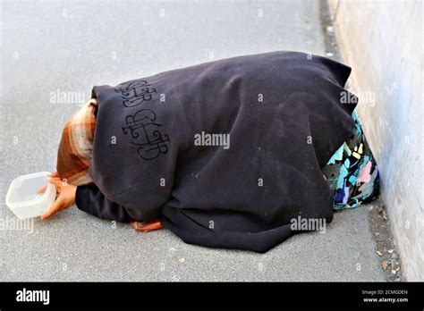 The old beggar woman Stock Photo - Alamy