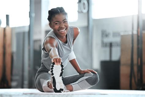 Premium Photo Gym Happy Or Portrait Of Black Woman Stretching Legs