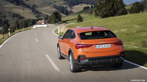 Audi Q3 Sportback | 2020MY (Color: Pulse Orange) | Rear Three-Quarter