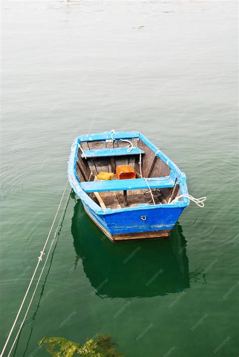 Premium Photo Blue Boat In Water On Bay Of Biscay