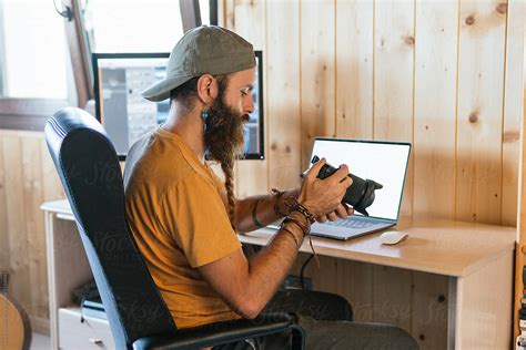 Photographer Working At Home By Stocksy Contributor Kike Arnaiz