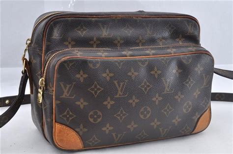 Authentic Louis Vuitton Nile Monogram Canvas Shoulder Bag