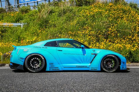 Bright Blue Liberty Walk Nissan GT R Posing GTspirit