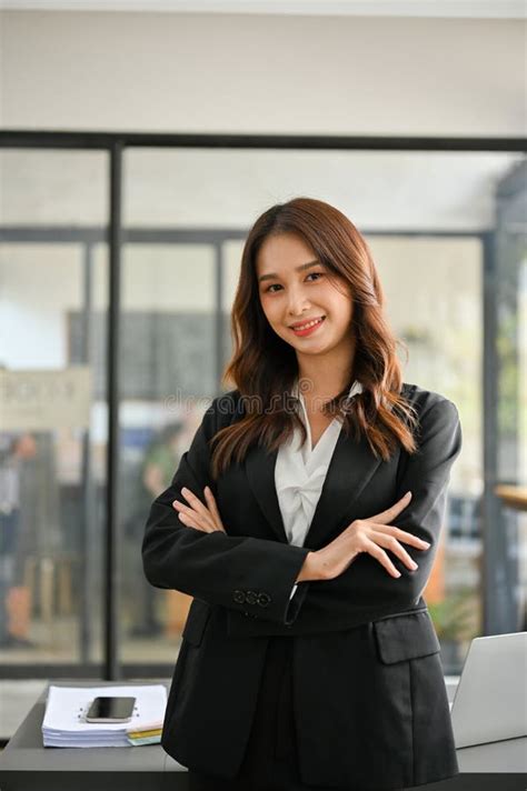 Successful Asian Businesswoman in Formal Business Suit Stands in Her ...