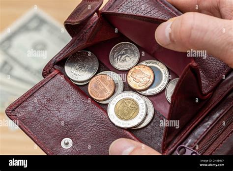 Panama money, Balboa coins in wallet and dollars background, Financial ...