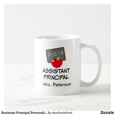 A Coffee Mug With The Words Assistant Principals Written On It And An Apple In Front