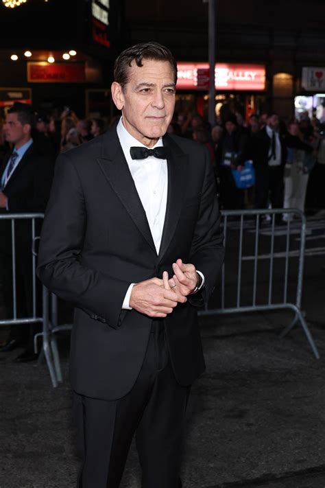 “The Hair Is Dark, the Face Is Smooth — George Clooney’s Red Carpet