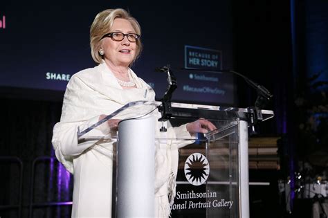 Hillary Clinton Surprises Guests In Rock Star Fashion At National Portrait Gallery Exhibition