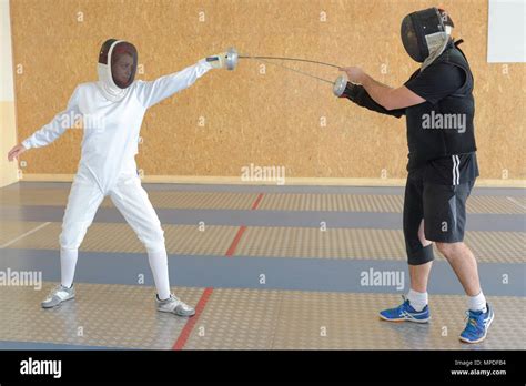 the fencing lesson Stock Photo - Alamy