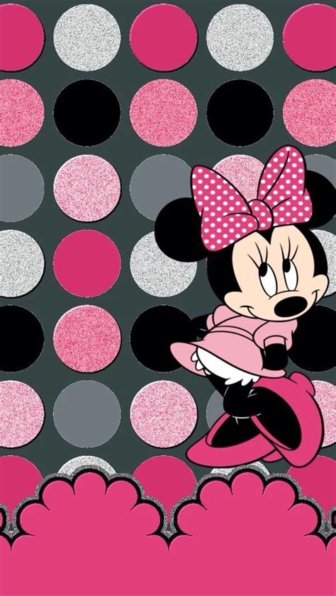 An Image Of Minnie Mouse In Pink And Black With Polka Dots On The Back