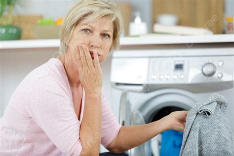 Nhappy Woman Using Washing Machine At Home Photo Background And Picture