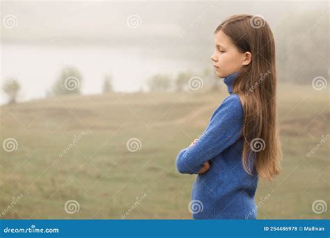 A Beautiful Young Girl Was Alone in Nature Stock Photo - Image of ...