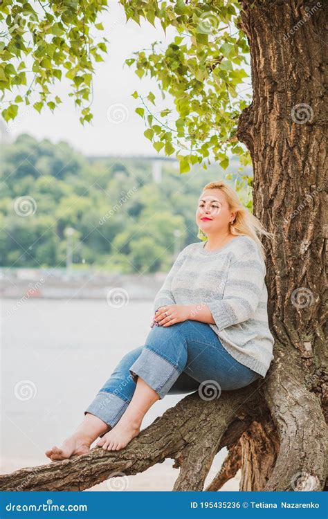 Plus Size Blonde Woman At Beach Lifestyle Stock Photo Image Of Green