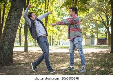 Man Pushing Another Man Images Stock Photos And Vectors