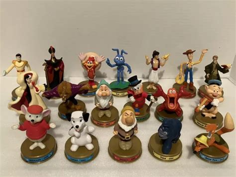 LOTE DE 18 figuras Mcdonald s Disney 100 años de magia 2002 Happy Meal