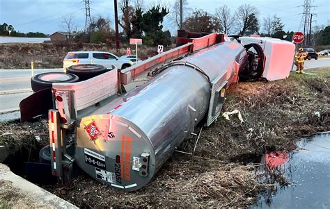 Tanker truck flips near Chesterfield Food Lion, HAZMAT crew responding