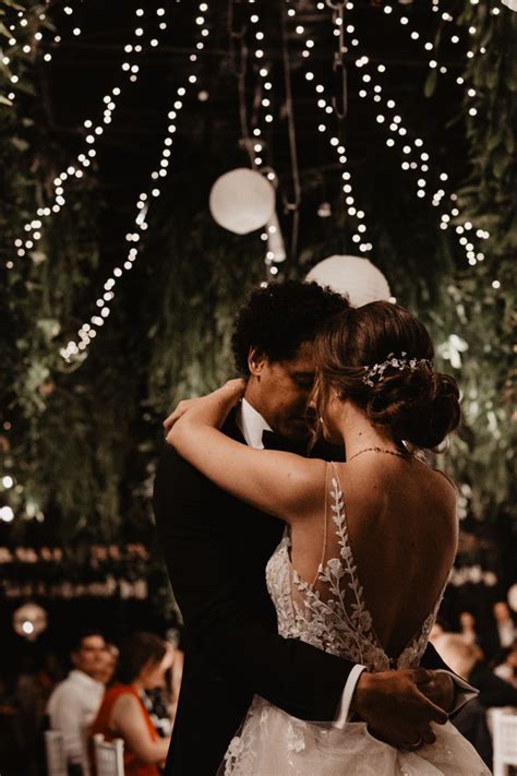 A Bride And Groom Sharing Their First Dance