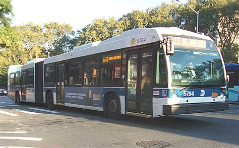 Riders are studying the m60 bus map for the new detour 16